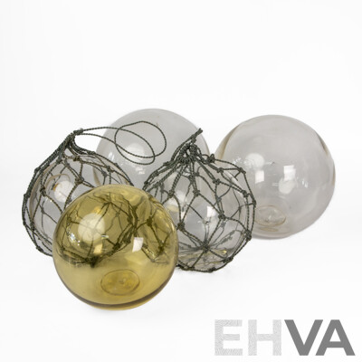 Collection of Five Japanese Hand Blown Glass Fishing Buoys in Various Sizes