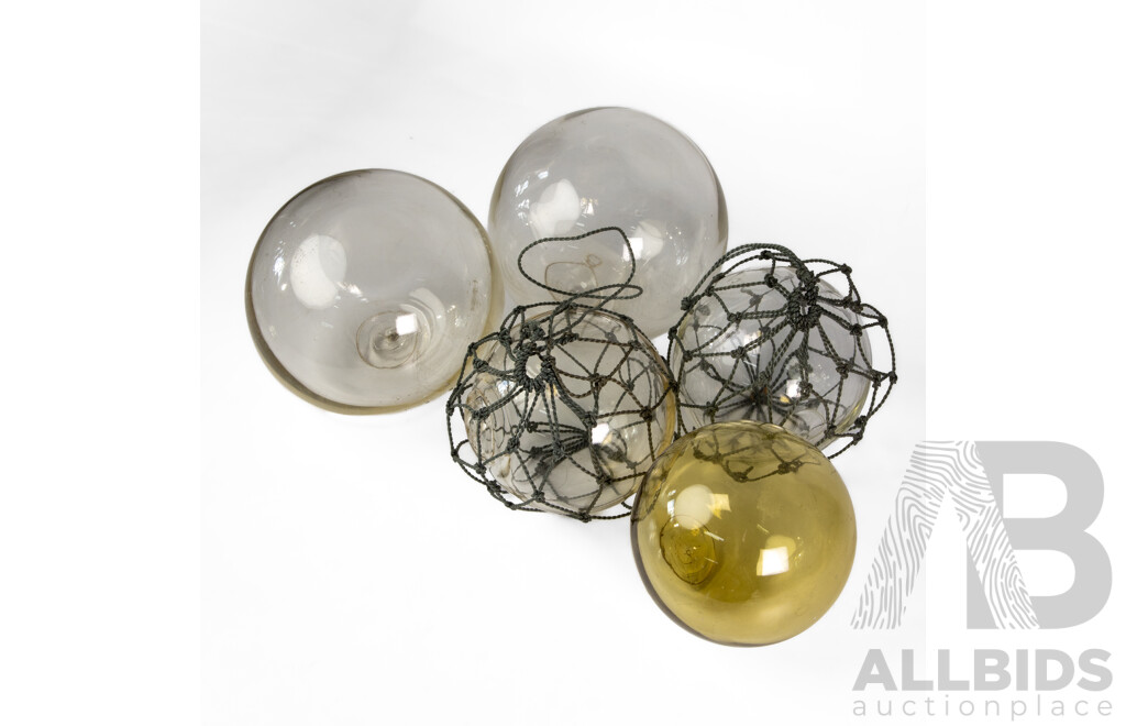 Collection of Five Japanese Hand Blown Glass Fishing Buoys in Various Sizes