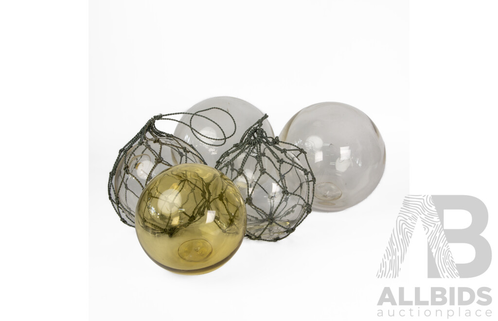 Collection of Five Japanese Hand Blown Glass Fishing Buoys in Various Sizes