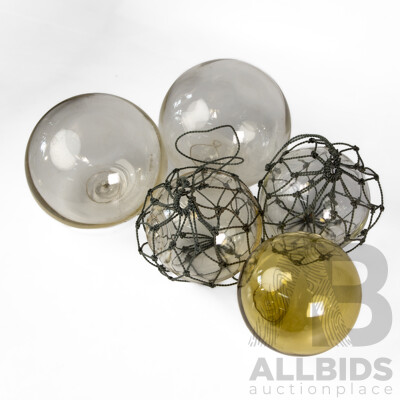 Collection of Five Japanese Hand Blown Glass Fishing Buoys in Various Sizes