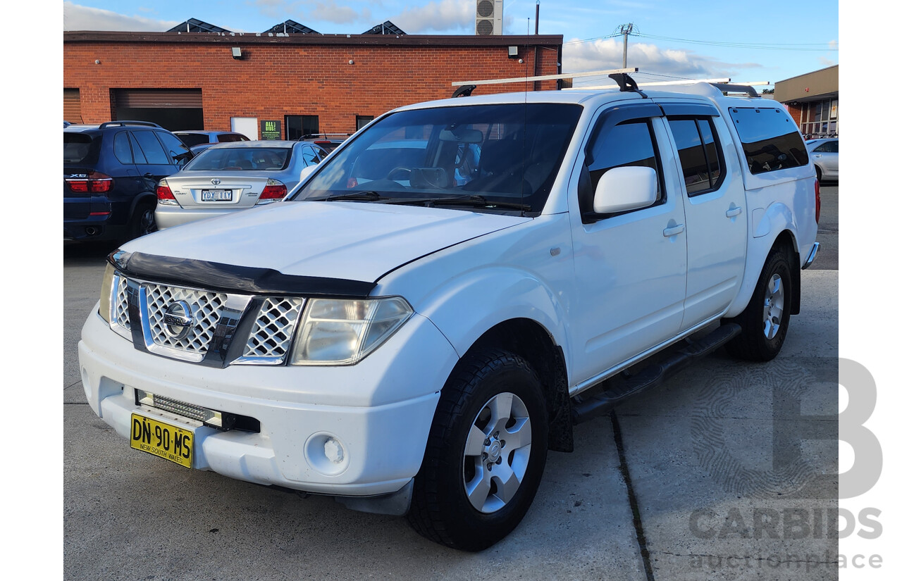 12/2012 Nissan Navara ST (4x4) D40 Dual Cab P/Up White 2.5L