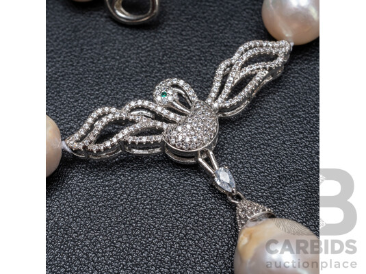 1660570 · Baroque Freshwater Pearl Necklace with Silver Tone & Cubic Zirconia Swan Pendant. Length - 55cms