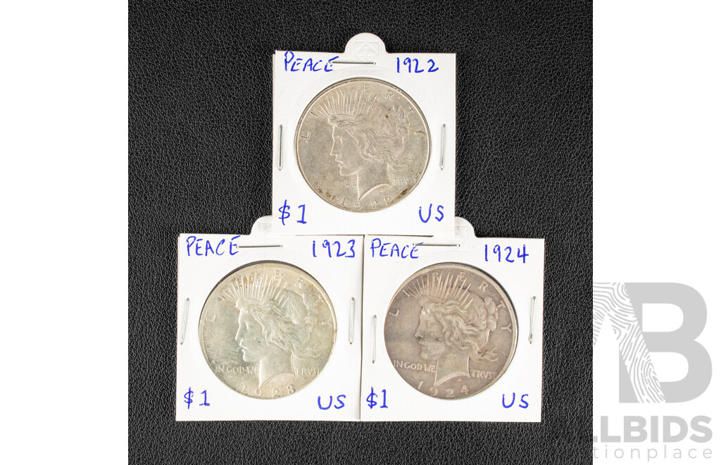 Three USA Silver Peace Dollars Including 1922, 1923, 1924 .900