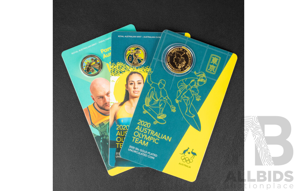 Three Australian RAM 2020 Commemorative Coins Including Gold Plated Fifty Cent, Australian Olympic Team, Two One Dollars, Beach Volley Ball and Wheelchair Rugby