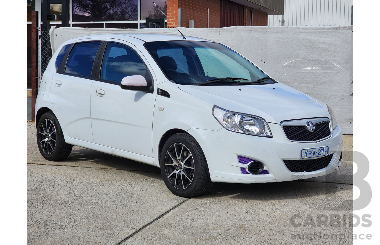 11/2011 Holden Barina  TK MY11 5d Hatchback White 1.6L