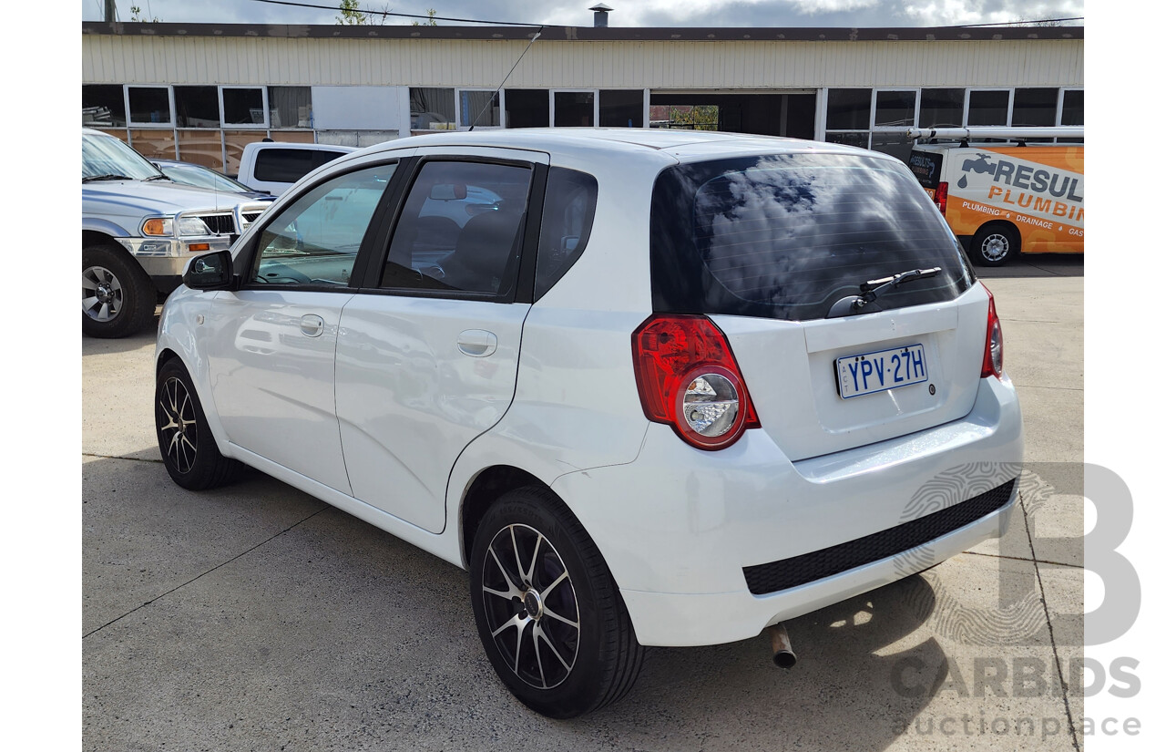 11/2011 Holden Barina  TK MY11 5d Hatchback White 1.6L