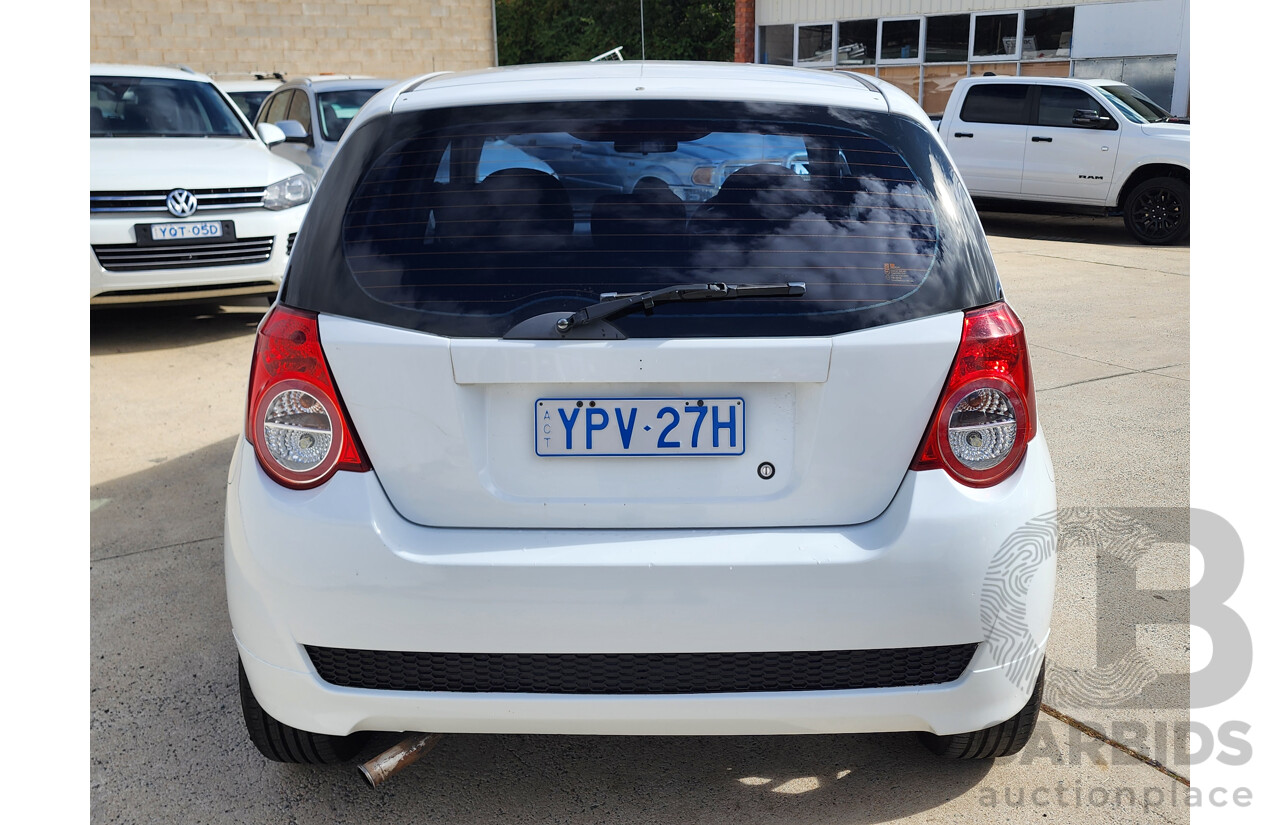 11/2011 Holden Barina  TK MY11 5d Hatchback White 1.6L