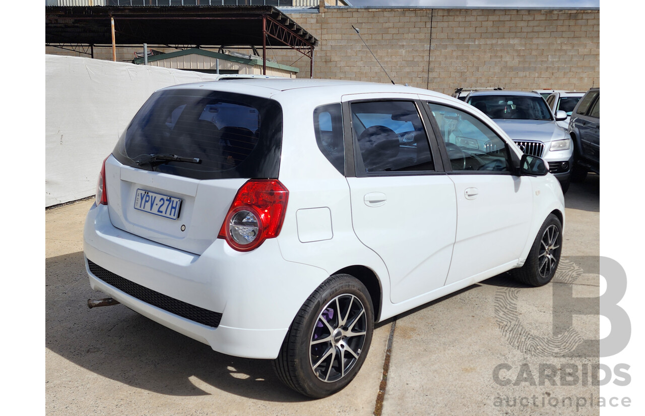 11/2011 Holden Barina  TK MY11 5d Hatchback White 1.6L