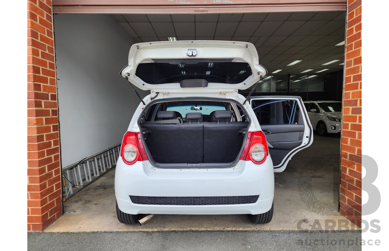 11/2011 Holden Barina  TK MY11 5d Hatchback White 1.6L