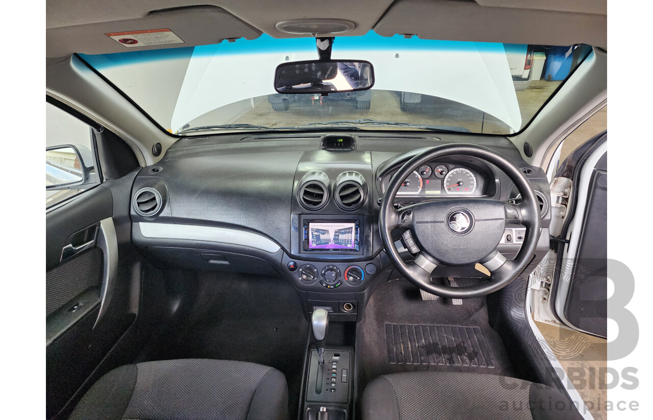 11/2011 Holden Barina  TK MY11 5d Hatchback White 1.6L