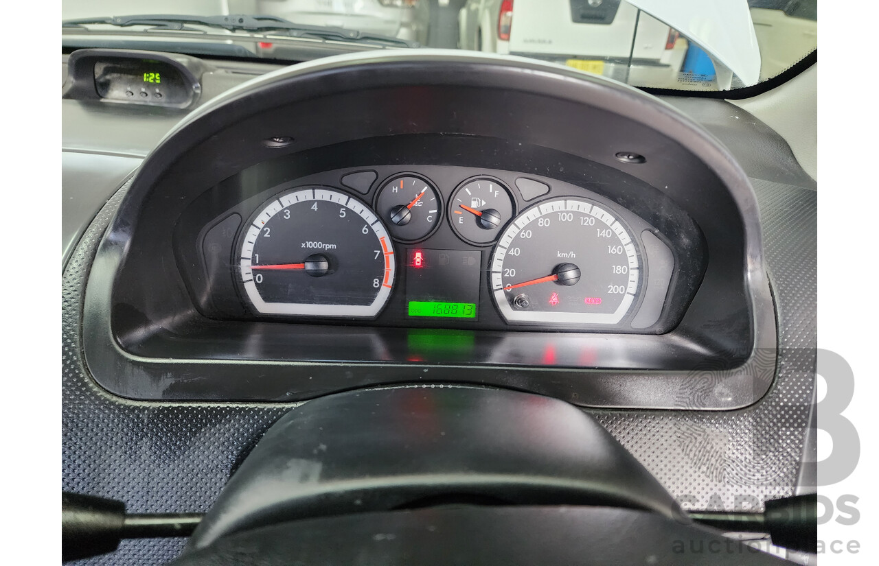 11/2011 Holden Barina  TK MY11 5d Hatchback White 1.6L