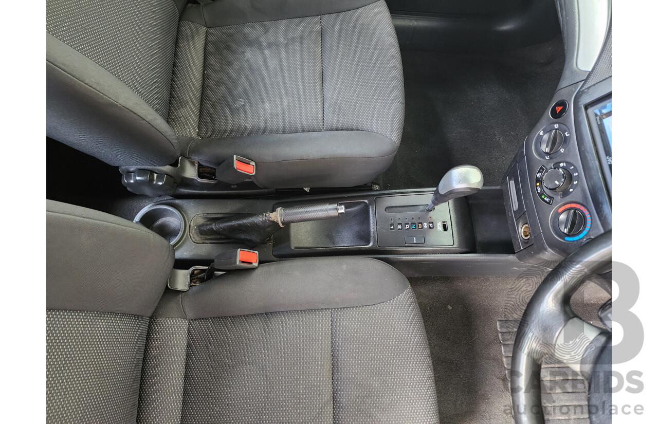 11/2011 Holden Barina  TK MY11 5d Hatchback White 1.6L