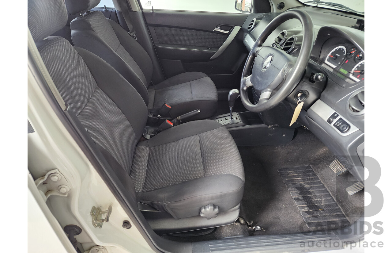 11/2011 Holden Barina  TK MY11 5d Hatchback White 1.6L