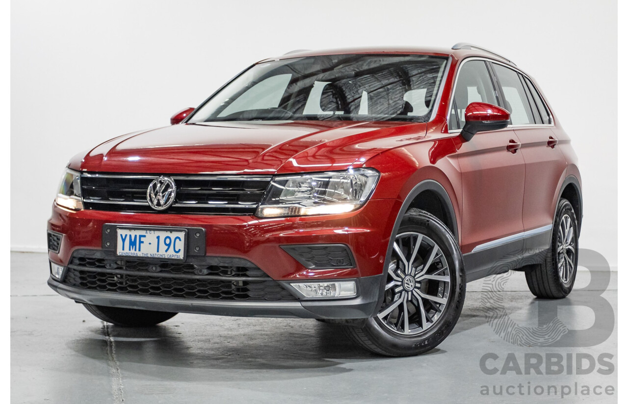 11/2016 Volkswagen Tiguan 132 TSI Comfortline (AWD) 5NA 4d Wagon Ruby Red Metallic Turbo 2.0L