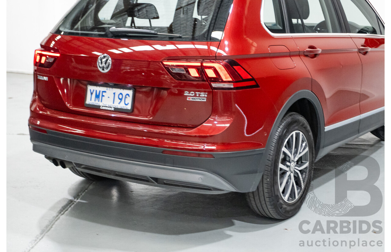 11/2016 Volkswagen Tiguan 132 TSI Comfortline (AWD) 5NA 4d Wagon Ruby Red Metallic Turbo 2.0L