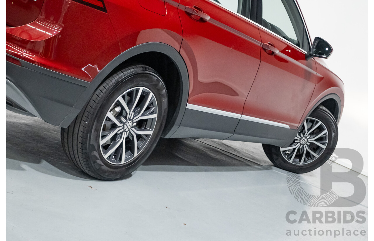 11/2016 Volkswagen Tiguan 132 TSI Comfortline (AWD) 5NA 4d Wagon Ruby Red Metallic Turbo 2.0L