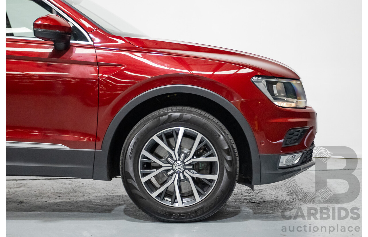 11/2016 Volkswagen Tiguan 132 TSI Comfortline (AWD) 5NA 4d Wagon Ruby Red Metallic Turbo 2.0L