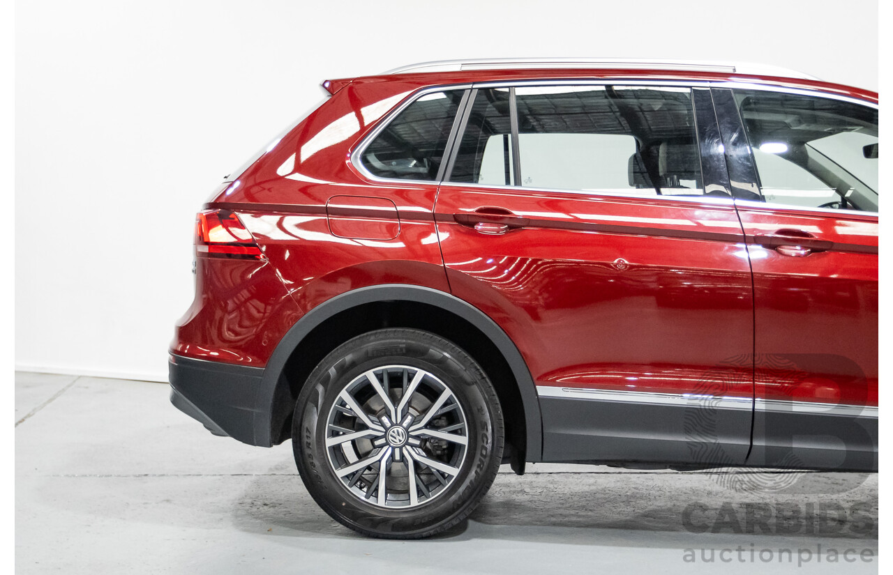 11/2016 Volkswagen Tiguan 132 TSI Comfortline (AWD) 5NA 4d Wagon Ruby Red Metallic Turbo 2.0L