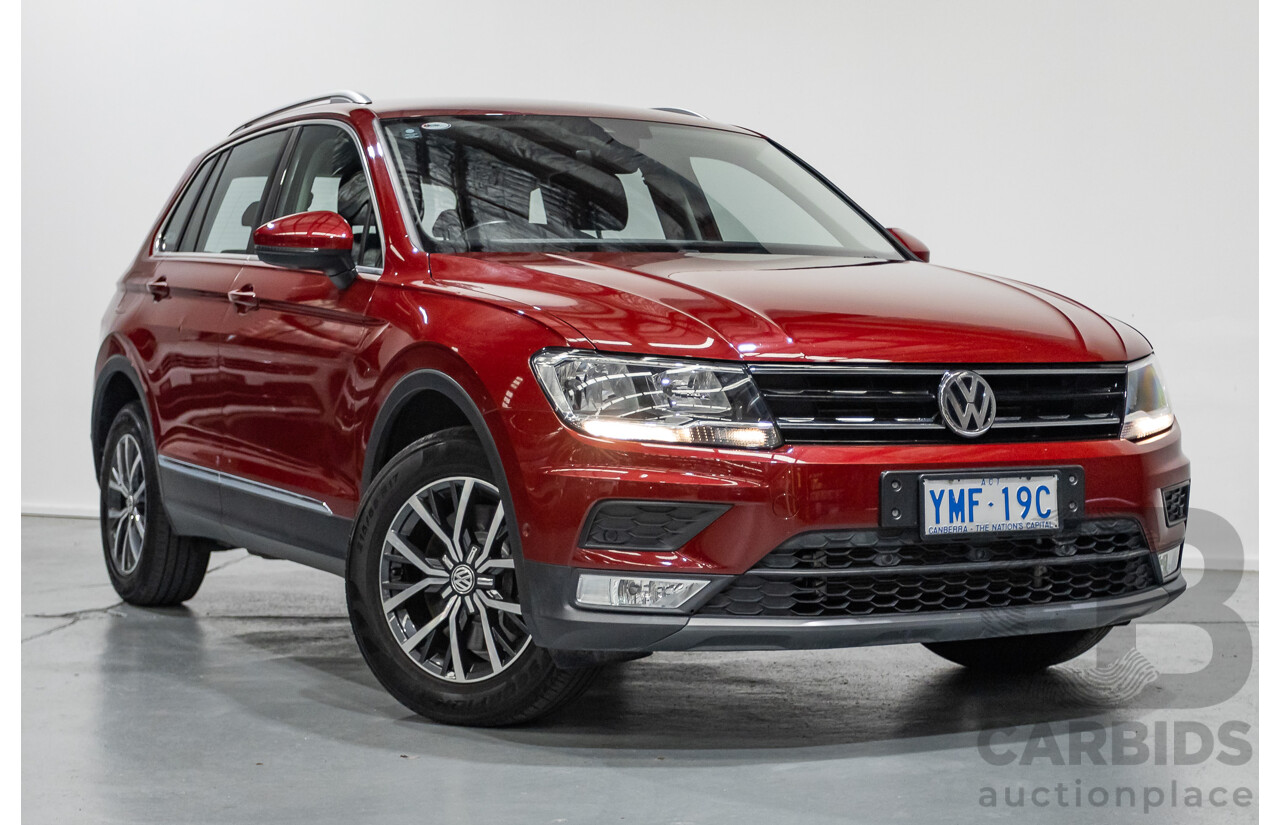 11/2016 Volkswagen Tiguan 132 TSI Comfortline (AWD) 5NA 4d Wagon Ruby Red Metallic Turbo 2.0L