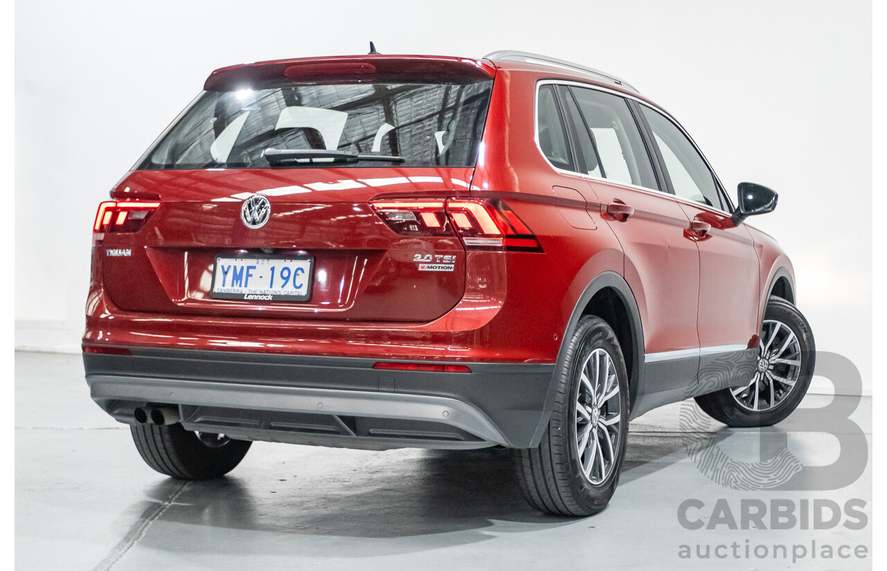11/2016 Volkswagen Tiguan 132 TSI Comfortline (AWD) 5NA 4d Wagon Ruby Red Metallic Turbo 2.0L