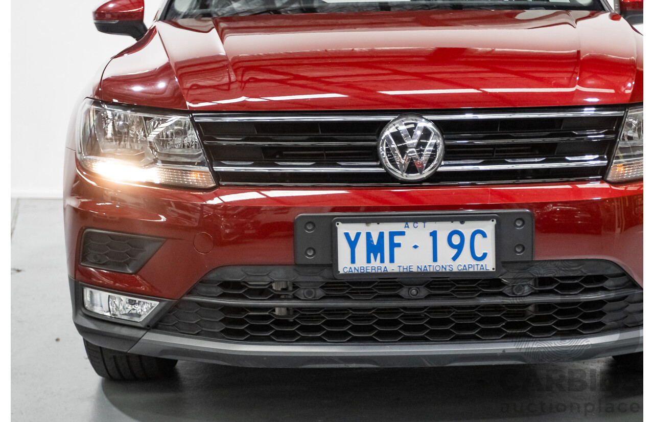 11/2016 Volkswagen Tiguan 132 TSI Comfortline (AWD) 5NA 4d Wagon Ruby Red Metallic Turbo 2.0L