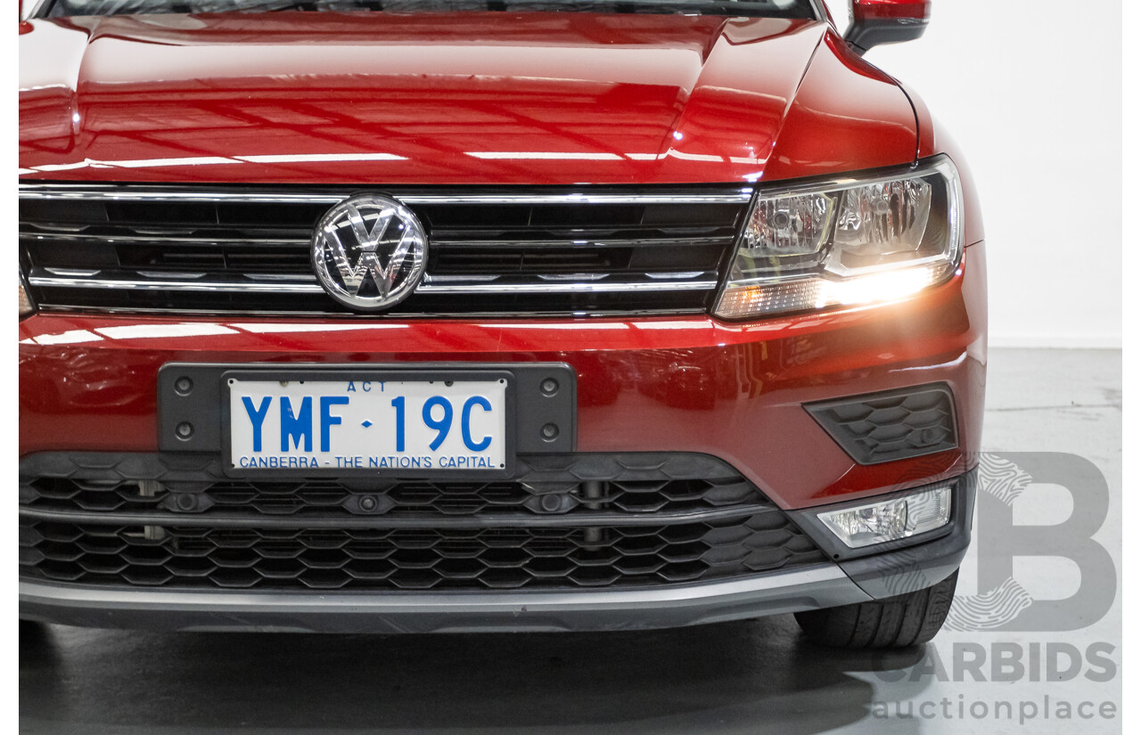 11/2016 Volkswagen Tiguan 132 TSI Comfortline (AWD) 5NA 4d Wagon Ruby Red Metallic Turbo 2.0L