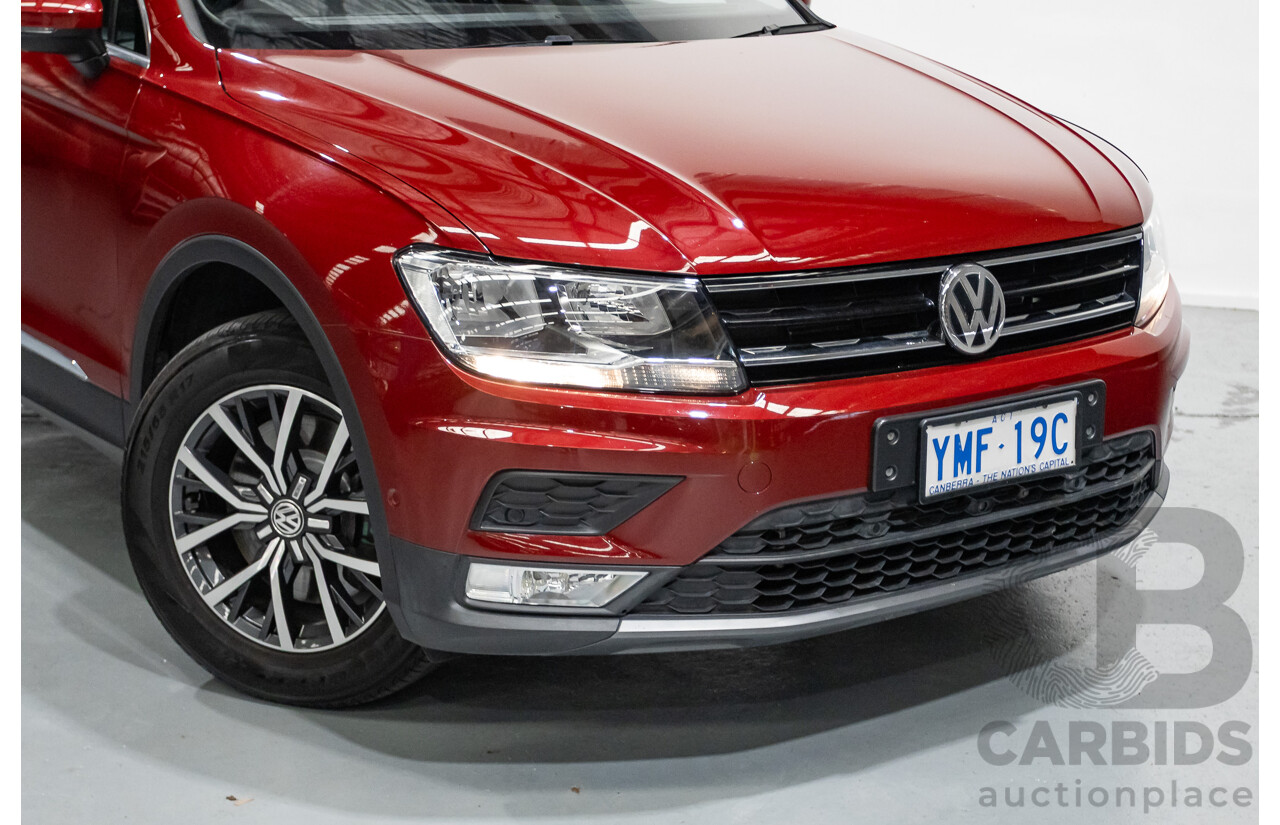 11/2016 Volkswagen Tiguan 132 TSI Comfortline (AWD) 5NA 4d Wagon Ruby Red Metallic Turbo 2.0L