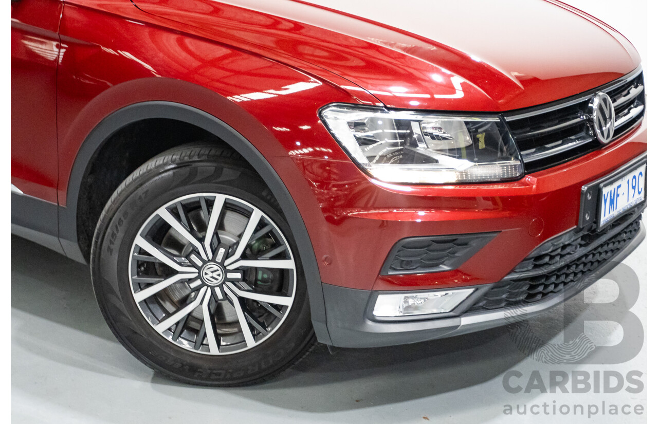 11/2016 Volkswagen Tiguan 132 TSI Comfortline (AWD) 5NA 4d Wagon Ruby Red Metallic Turbo 2.0L