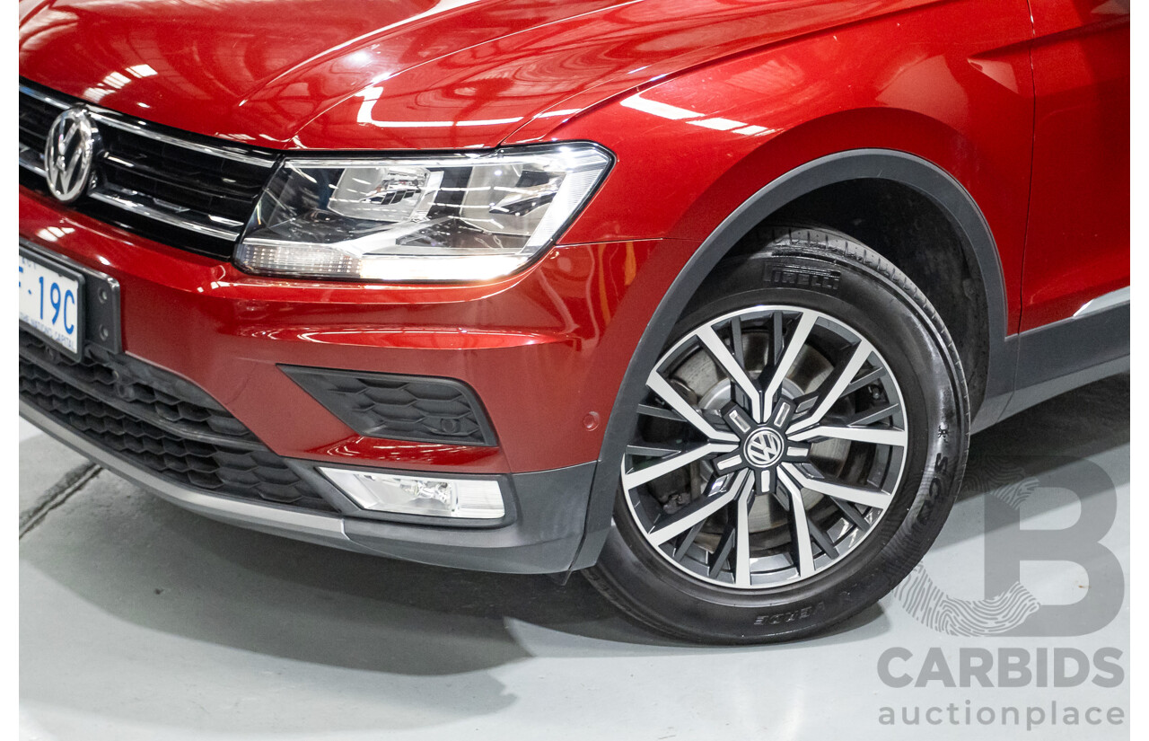 11/2016 Volkswagen Tiguan 132 TSI Comfortline (AWD) 5NA 4d Wagon Ruby Red Metallic Turbo 2.0L