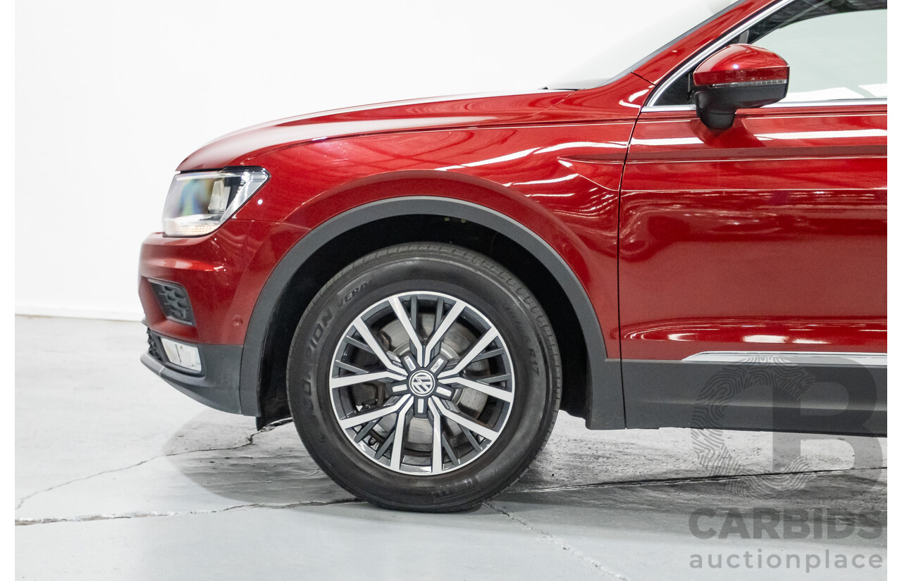 11/2016 Volkswagen Tiguan 132 TSI Comfortline (AWD) 5NA 4d Wagon Ruby Red Metallic Turbo 2.0L
