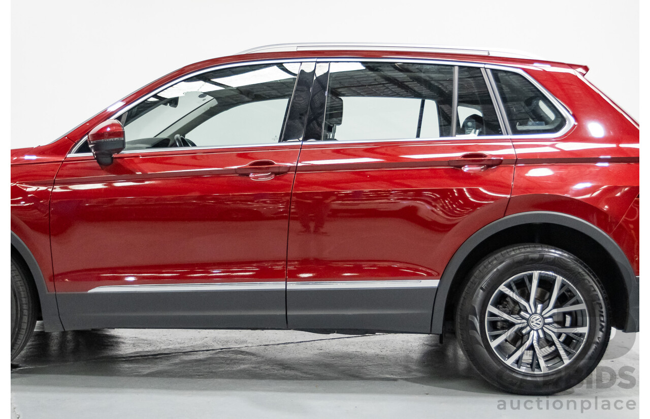 11/2016 Volkswagen Tiguan 132 TSI Comfortline (AWD) 5NA 4d Wagon Ruby Red Metallic Turbo 2.0L
