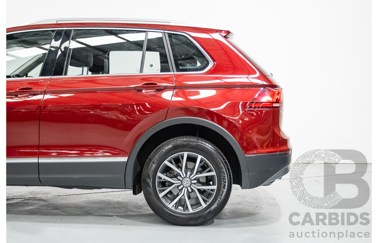 11/2016 Volkswagen Tiguan 132 TSI Comfortline (AWD) 5NA 4d Wagon Ruby Red Metallic Turbo 2.0L