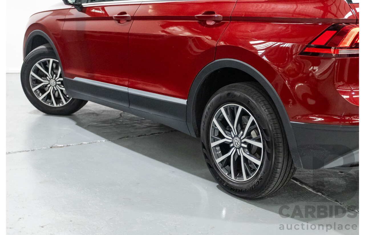 11/2016 Volkswagen Tiguan 132 TSI Comfortline (AWD) 5NA 4d Wagon Ruby Red Metallic Turbo 2.0L