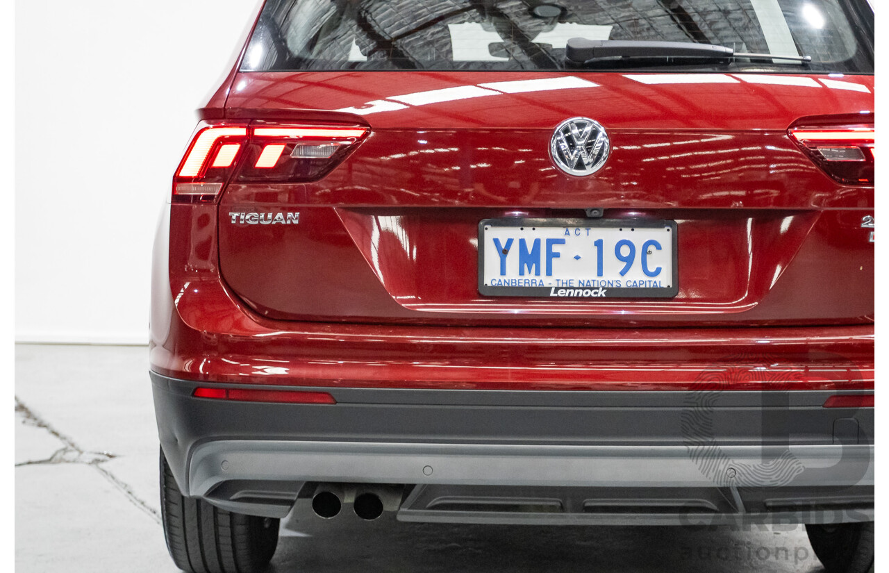 11/2016 Volkswagen Tiguan 132 TSI Comfortline (AWD) 5NA 4d Wagon Ruby Red Metallic Turbo 2.0L