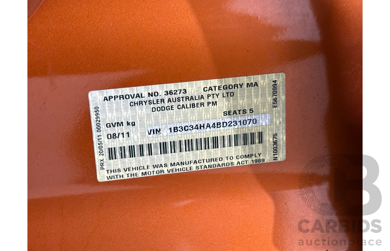 8/2011 Dodge Caliber SXT PM MY10 5d Hatchback Orange 2.0L