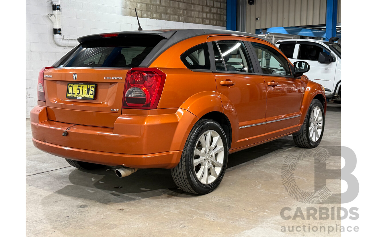 8/2011 Dodge Caliber SXT PM MY10 5d Hatchback Orange 2.0L
