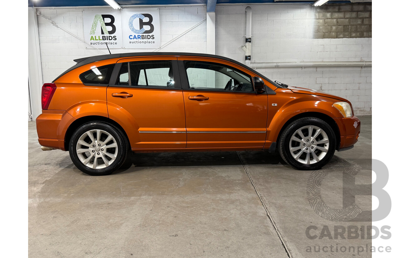 8/2011 Dodge Caliber SXT PM MY10 5d Hatchback Orange 2.0L