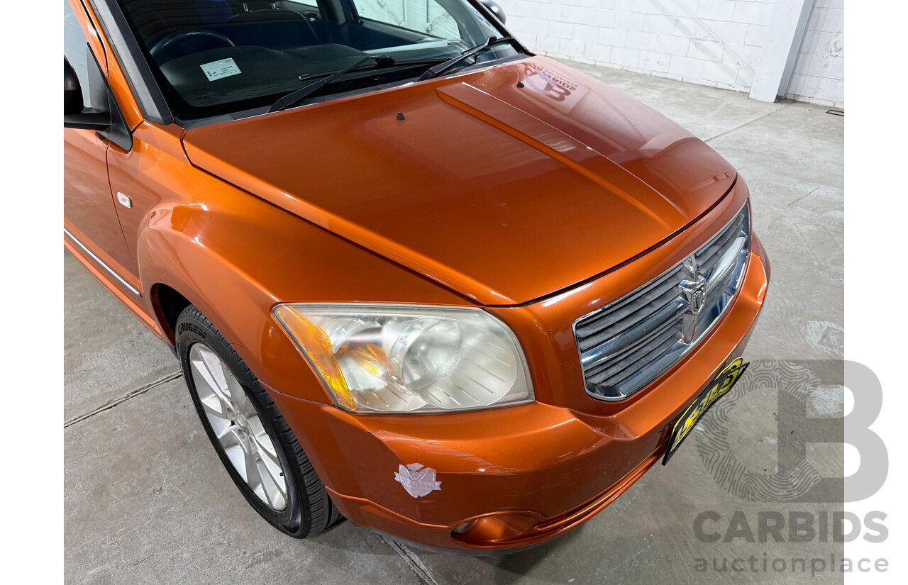 8/2011 Dodge Caliber SXT PM MY10 5d Hatchback Orange 2.0L