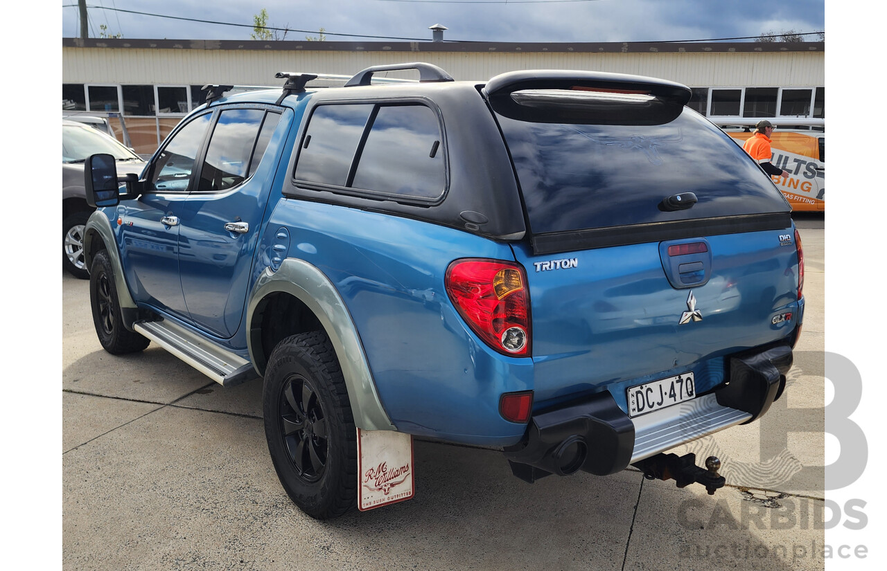 10/2006 Mitsubishi Triton GLX (4x4) ML Double Cab Utility Blue 3.2L