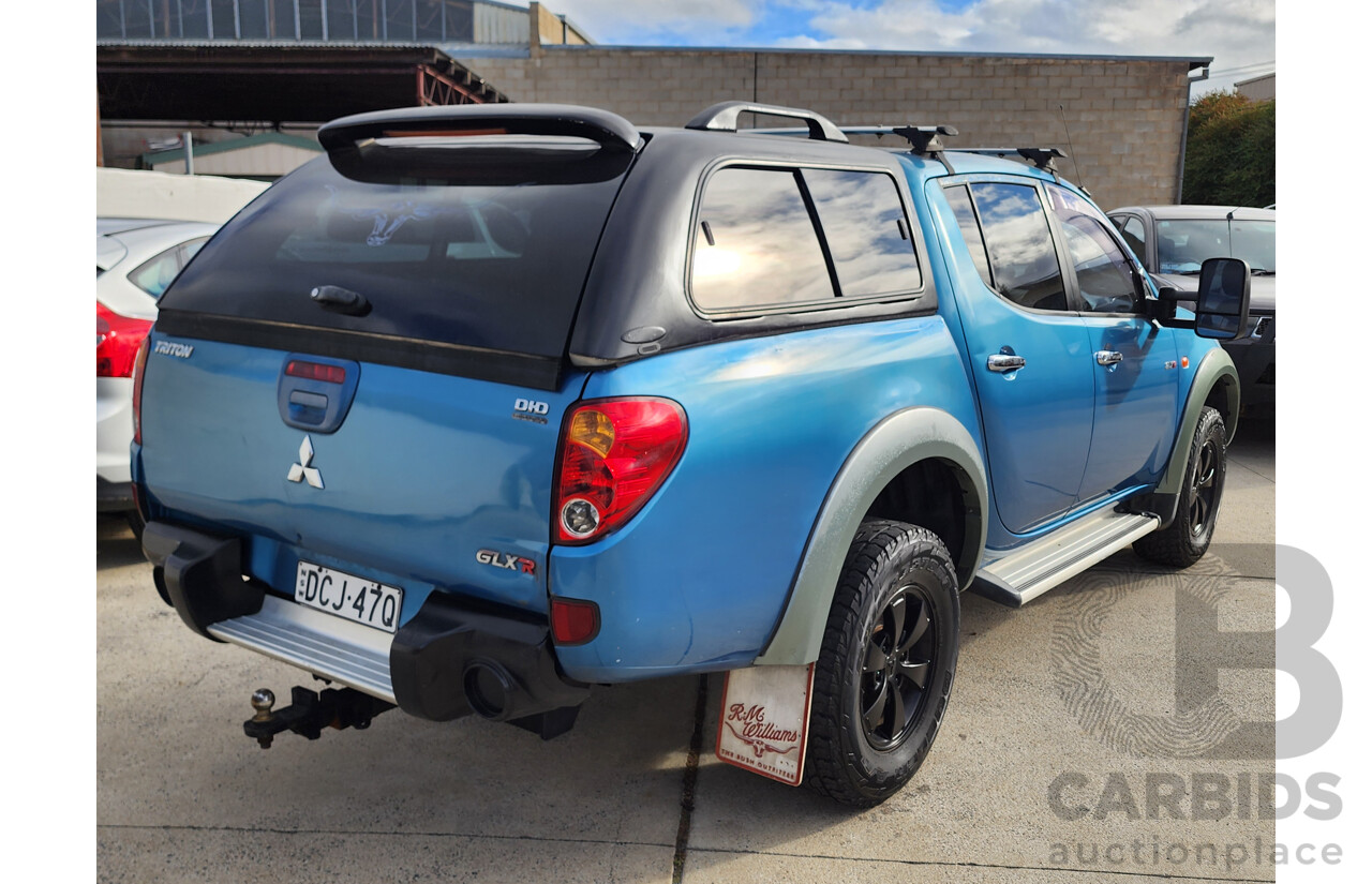 10/2006 Mitsubishi Triton GLX (4x4) ML Double Cab Utility Blue 3.2L