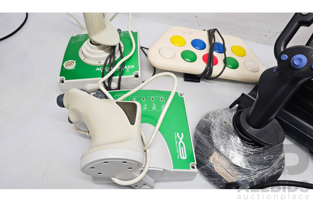 Assorted Lot of Videogame Aircraft Joysticks Controllers