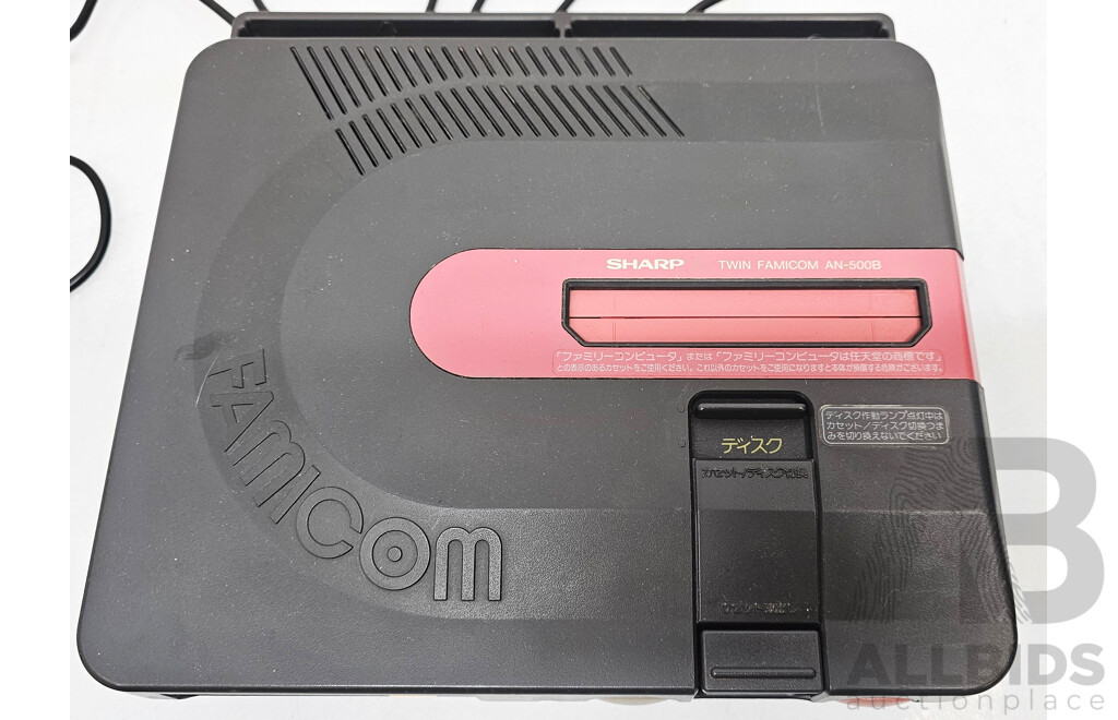 Sharp (AN-500B) Twin Famicom W/ Cables, Controllers & Games