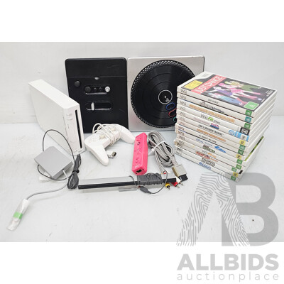 Nintendo (RVL-001) Wii Videogame Console W/ Games, Controllers, & Cables
