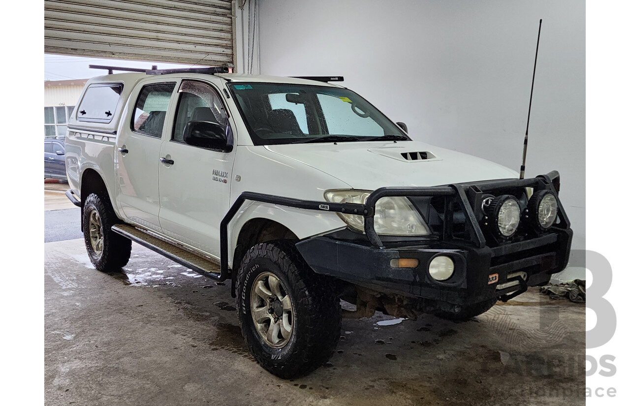 10/2009 Toyota Hilux SR (4x4) KUN26R 08 UPGRADE Dual Cab P/Up White 3.0L