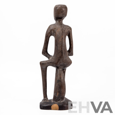Carved Central African Figure of a Seated Man