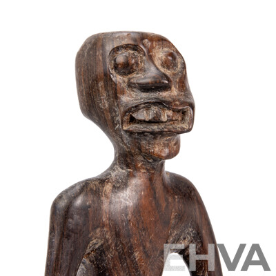Carved Central African Figure of a Seated Man