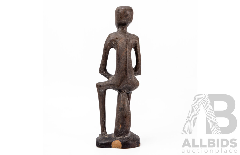 Carved Central African Figure of a Seated Man