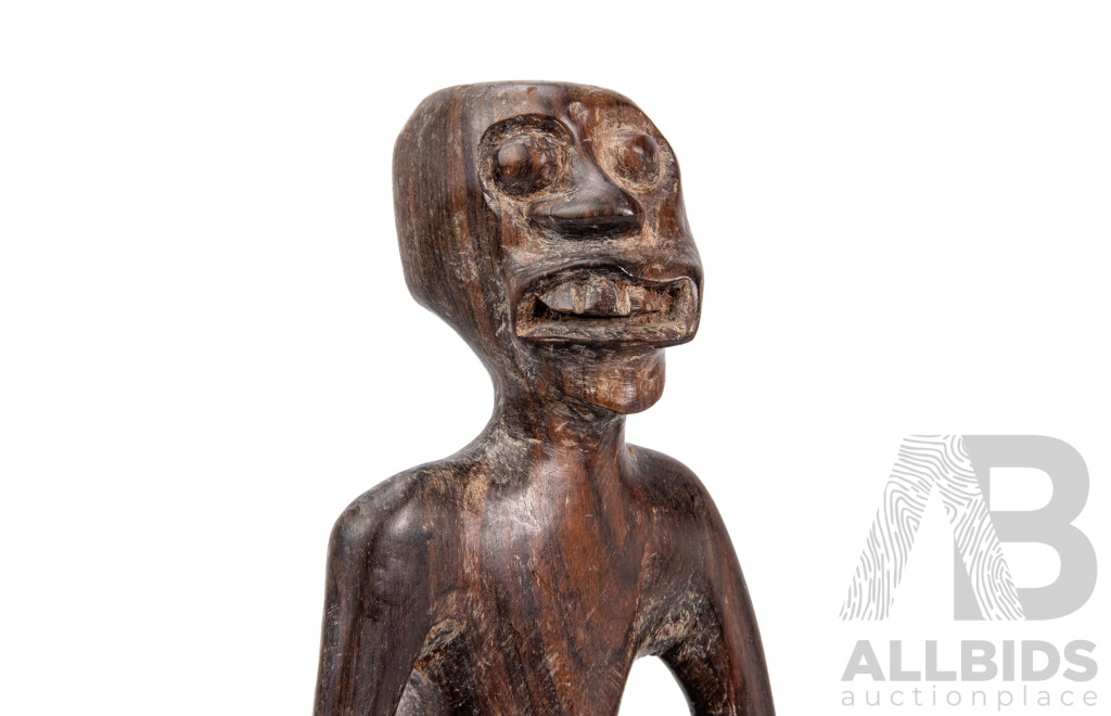 Carved Central African Figure of a Seated Man