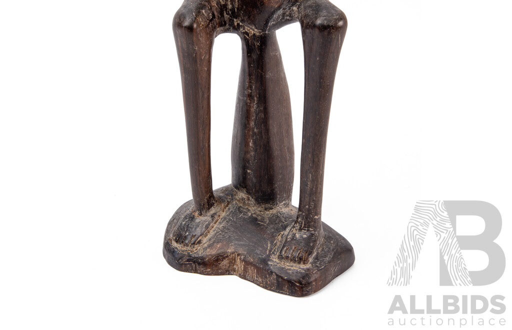Carved Central African Figure of a Seated Man