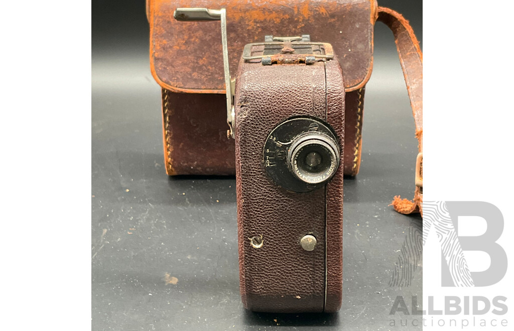 Vintage Photography Equipment, Including KODAK Brownie Box Camera, Baby-Cine Camera and Large Lamp - Lot of 3